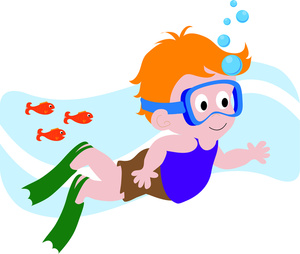 little boy swimming underwater with snorkel mask